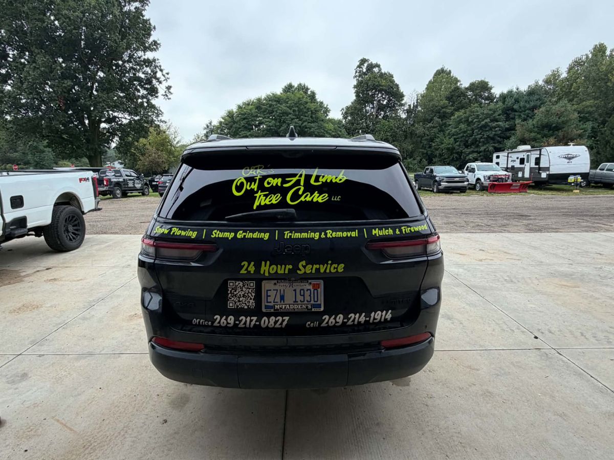Window tint job: Tree care SUV — rear